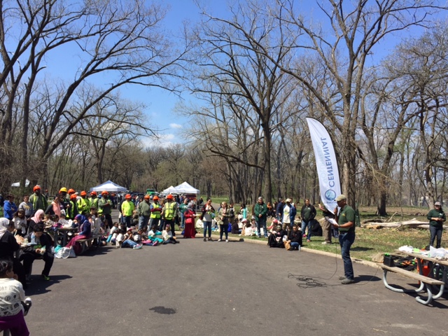 Out Our Front Door Organization Helps out Friends of the Major Taylor Trail. Photo of Volunteers gathering at whistler woods in Cook County's Forest Preserve. At Whistler Woods